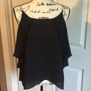 Black tank w/ metal criss cross straps